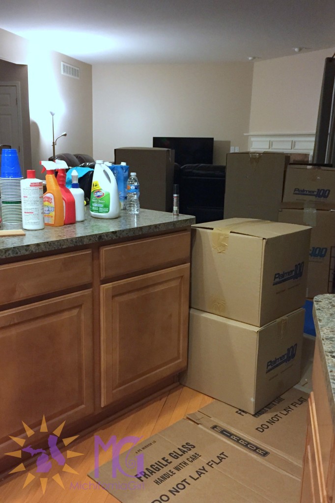 kitchen packed up with moving boxes
