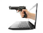 hand with gun coming out of laptop love your spouse follow-up post